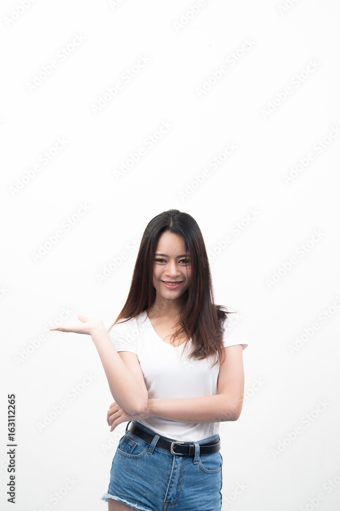 Beautiful young asian woman with hand showing for advertising isolated on white background. Beautiful young asian woman with hand showing for advertising isolated on white background.