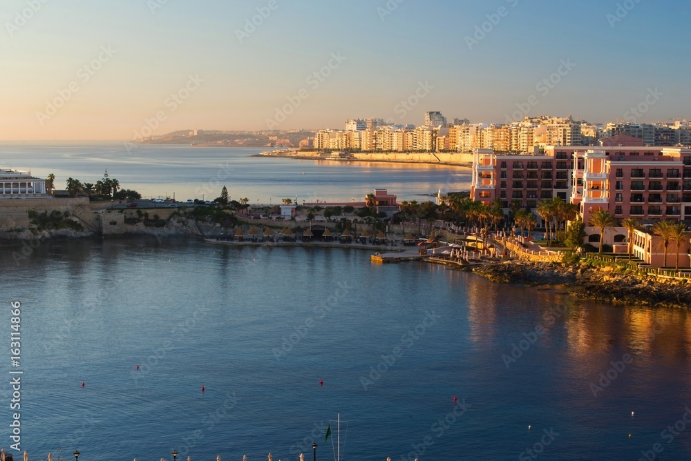 Sunrise above St. Julian ´s bay, Dragonara, Paceville and Sliema city, Malta.