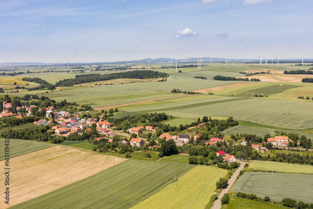 Naklejka premium aerial view of the Lasowice village and harvest fields