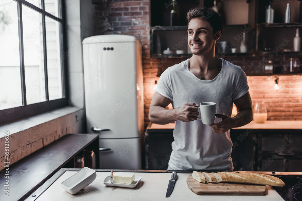 Man on kitchen