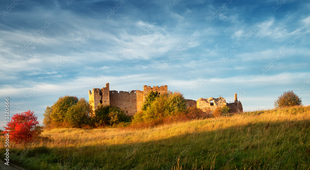 Old castle ruins in sunset light. Toolse in northern Estonia