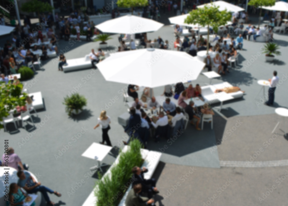 Fototapeta premium People in cafe with a blurred background.