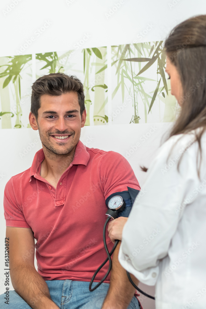 Fototapeta premium Cheerful male patient and doctor