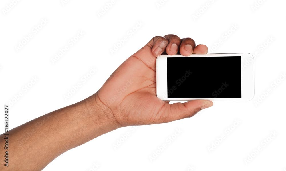 Hand holding mobile smart phone with blank screen Hand holding mobile smart phone with blank screen