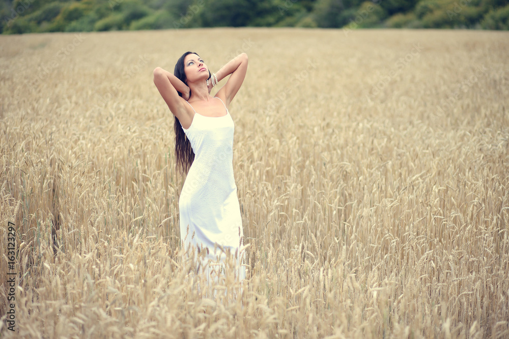 beautiful girl standing in rye field beautiful girl standing in rye field