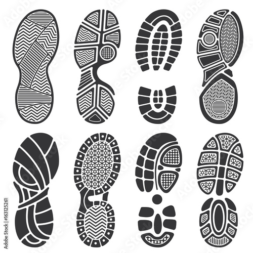 Isolated footprint vector silhouettes. Dirty shoes and sneakers footprints