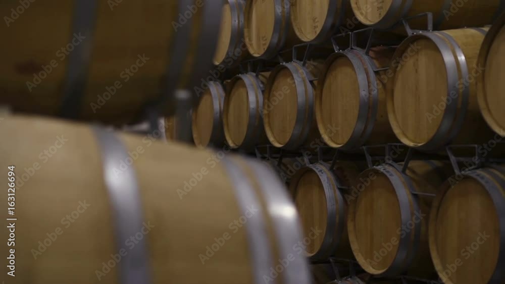 Wine barrels in wine cellar Wine barrels in wine cellar