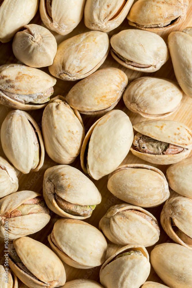 Many salt pistachio nuts full screen top view Many salt pistachio nuts full screen top view