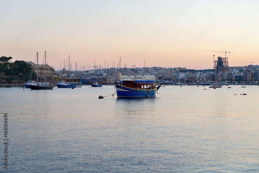 Ship moored in St. Elmo bay, Valetta, Malta.
