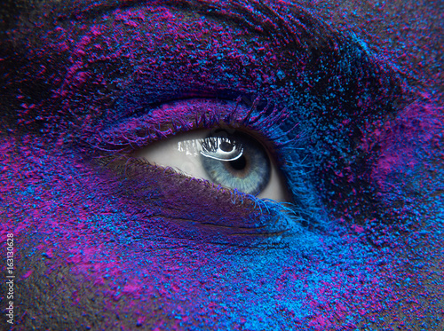 Canvas Print Macro and close-up creative make-up theme: Beautiful female eye with dry paint d