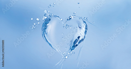 Bild auf Leinwand A heart made of water floating in blue water.