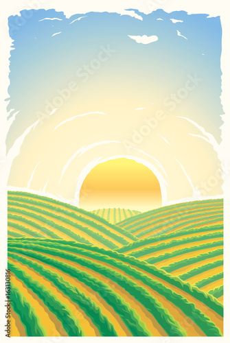 Rural landscape with sunrise over the hills