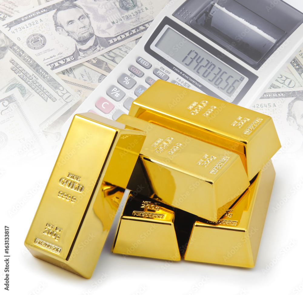 Gold bullion bars stacked on top of each other with financial background Gold bullion bars stacked on top of each other with financial background