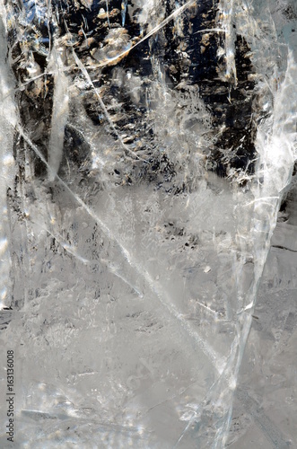 Natural transparent ice crystals texture cracked background