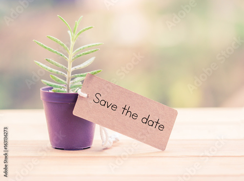 Writing save the date on card
