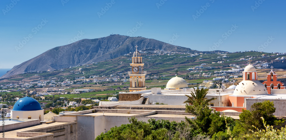 Panoramic view of Santorini island skyline and mountains background Panoramic view of Santorini island skyline and mountains background