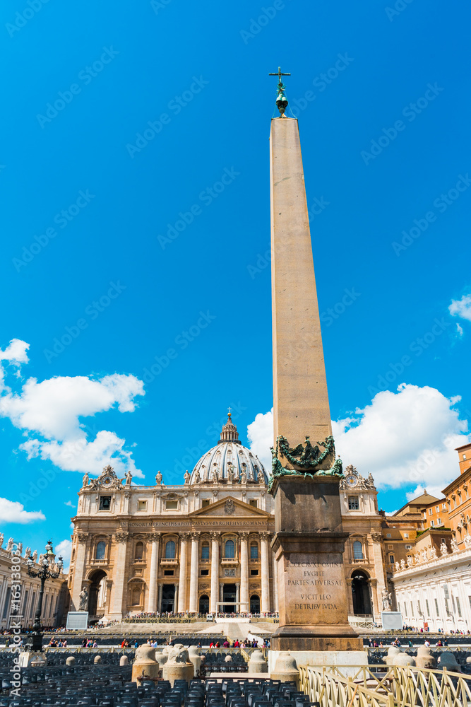 big monument with St. Peter's Basilica