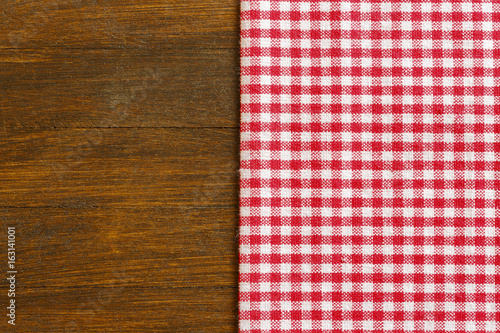 Tablecloth on the wooden table./Tablecloth on the wooden table