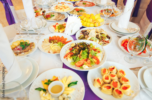 Ready meals on the wedding table. Cold starters