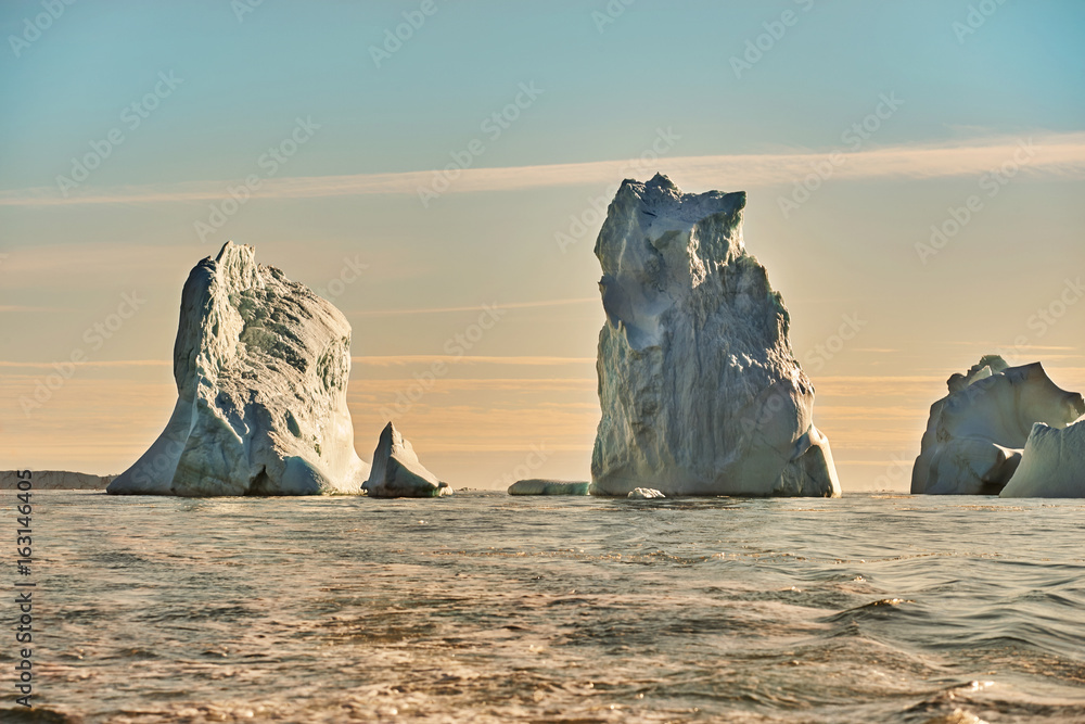 iceberg-floating-in-greenland-fjord-stock-photo-adobe-stock