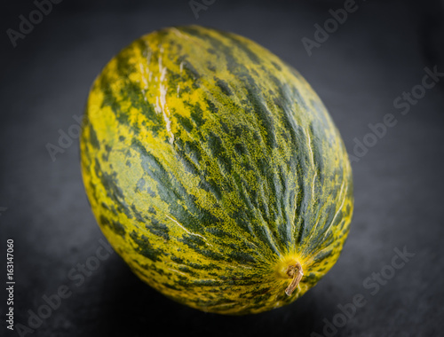 Some Futuro Melons on a dark slate slab