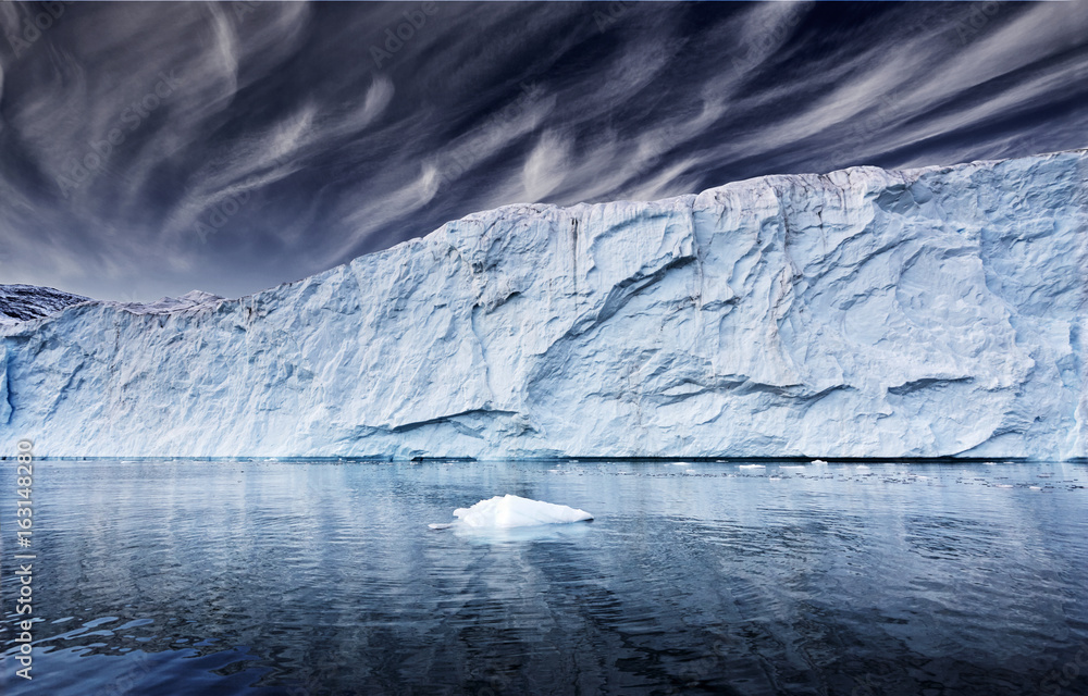 iceberg-floating-in-greenland-fjord-stock-photo-adobe-stock