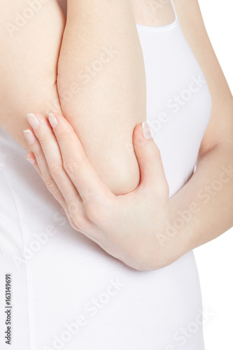 Wallpaper Mural Woman holding elbow in pain isolated on white, clipping path Torontodigital.ca