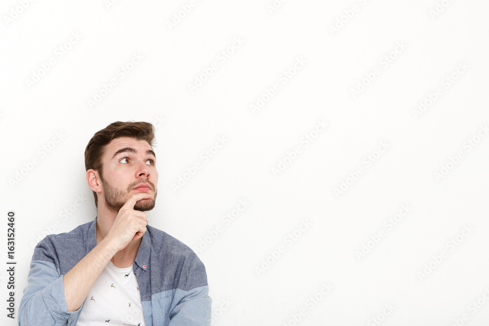 Thoughtful man dreaming, looking away Thoughtful man dreaming, looking away