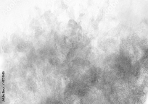 Freeze motion of colored powder explosion isolated on white background.