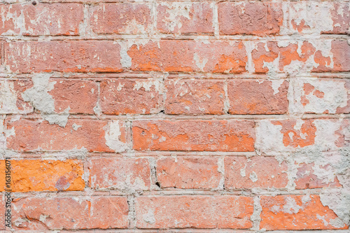 Vintage damaged brick wall with cracks, background and texture, for natural design, patterns, extured background with space for copy text.