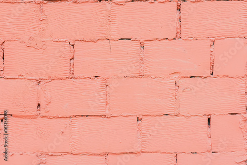 Close-up of old painted brick wall, natural grunge texture for natural design, patterns