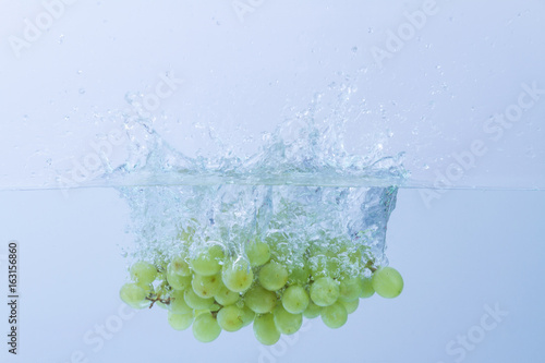 Grape splashing in water