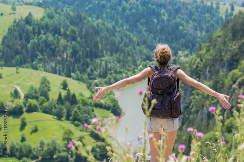 blonde girl embracing nature