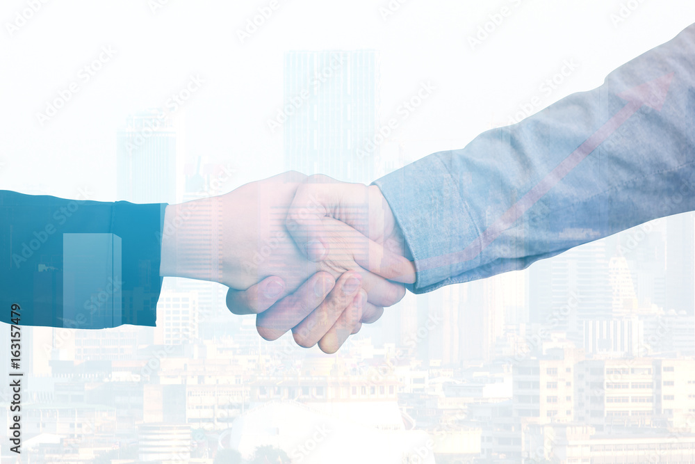 Closeup of Two Business Men Shaking Hands