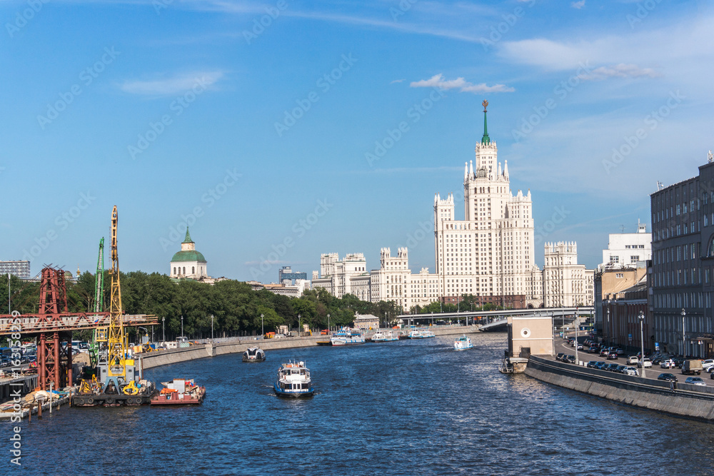 Skyscraper building on the waterfront promenade in Moscow, Russia Skyscraper building on the waterfront promenade in Moscow, Russia