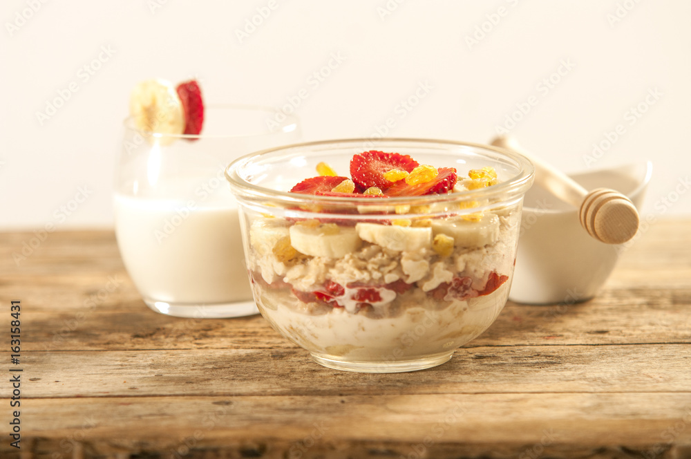 oatmeal porridge with strawberry and banana in a bowl oatmeal porridge with strawberry and banana in a bowl