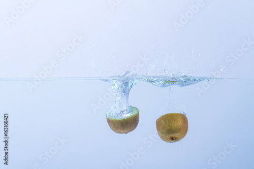 Kiwi splashing in water