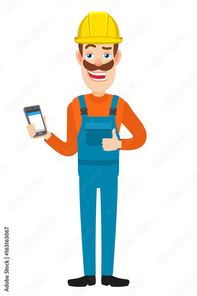 Builder holding mobile phone and showing thumb up Builder holding mobile phone and showing thumb up