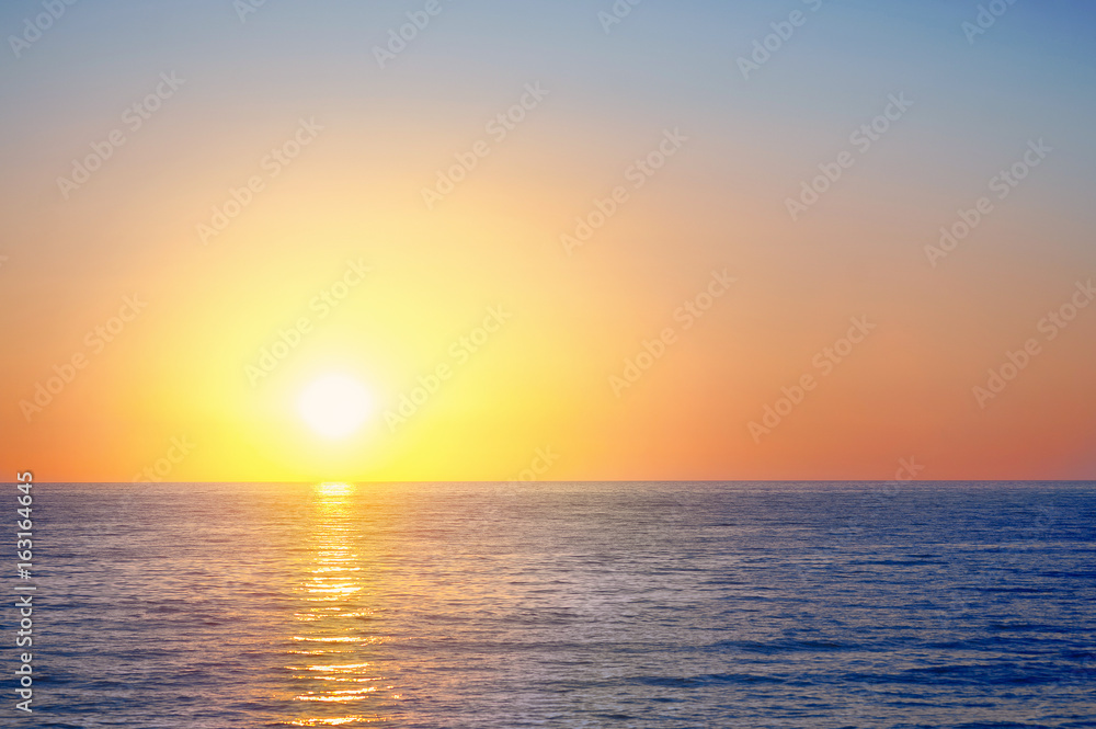 Scenic view of beautiful sunset above the sea Scenic view of beautiful sunset above the sea