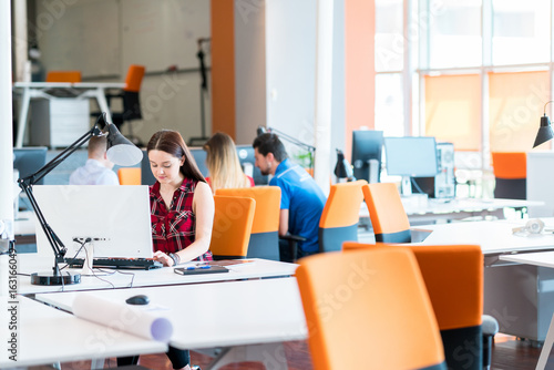 startup business, software developer working on computer at modern office