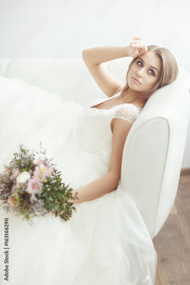 Portrait of a bride with a bouquet