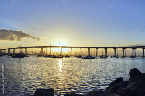 Shortly after sunrise, Coronado Bay bridge is bathed in golden light