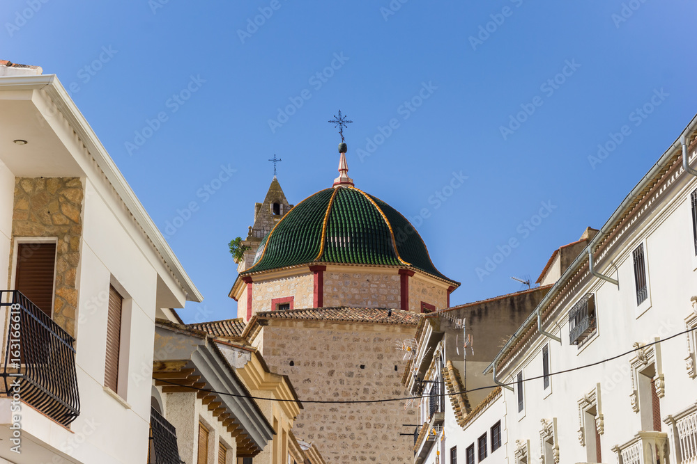 Green tiled dome of the church in Alcala del Jucar