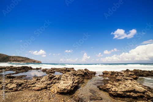Rock beach in south italy with rough sea