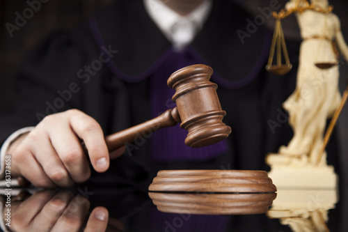 Law and justice concept, Brown wooden background, beautiful reflections