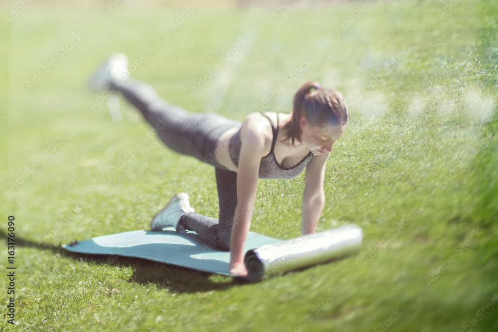 Fototapeta premium Girl doing exercises