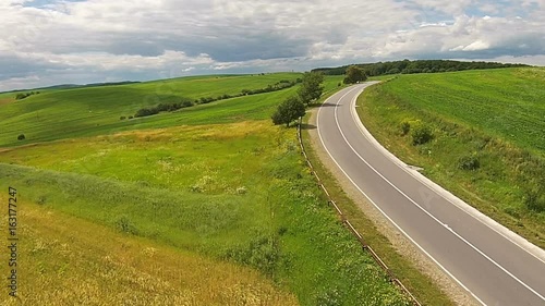 Aerial view of the sown fields near the motorway photo