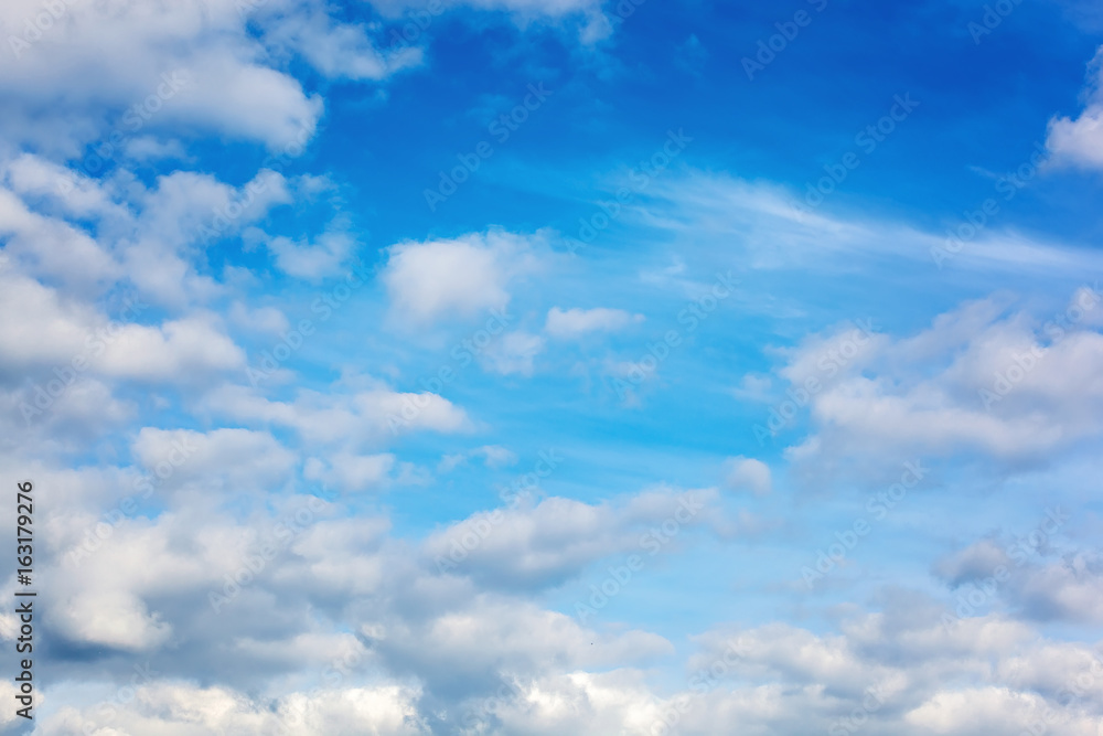 Beautiful blue sky with white fluffy clouds Beautiful blue sky with white fluffy clouds