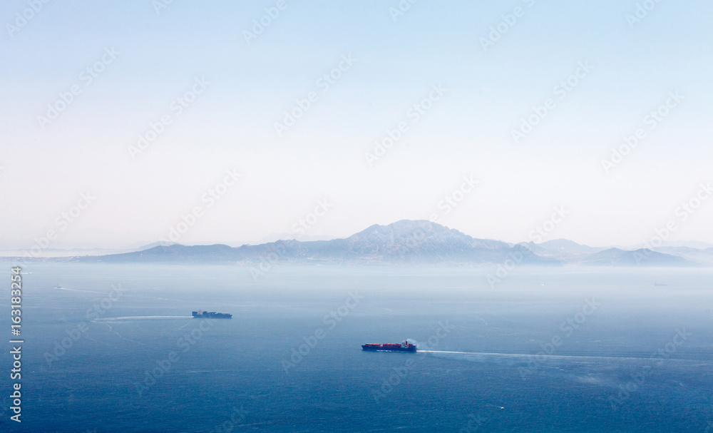 Gibraltar strait with passing tankers Gibraltar strait with passing tankers