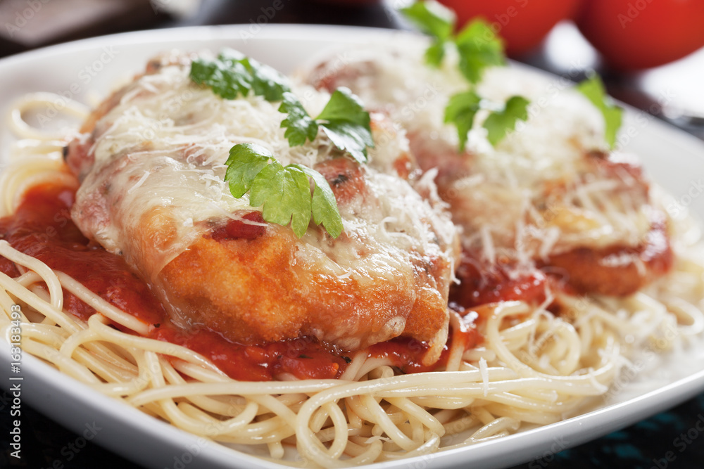 Italian chicken parmesan with spaghetti pasta Italian chicken parmesan with spaghetti pasta